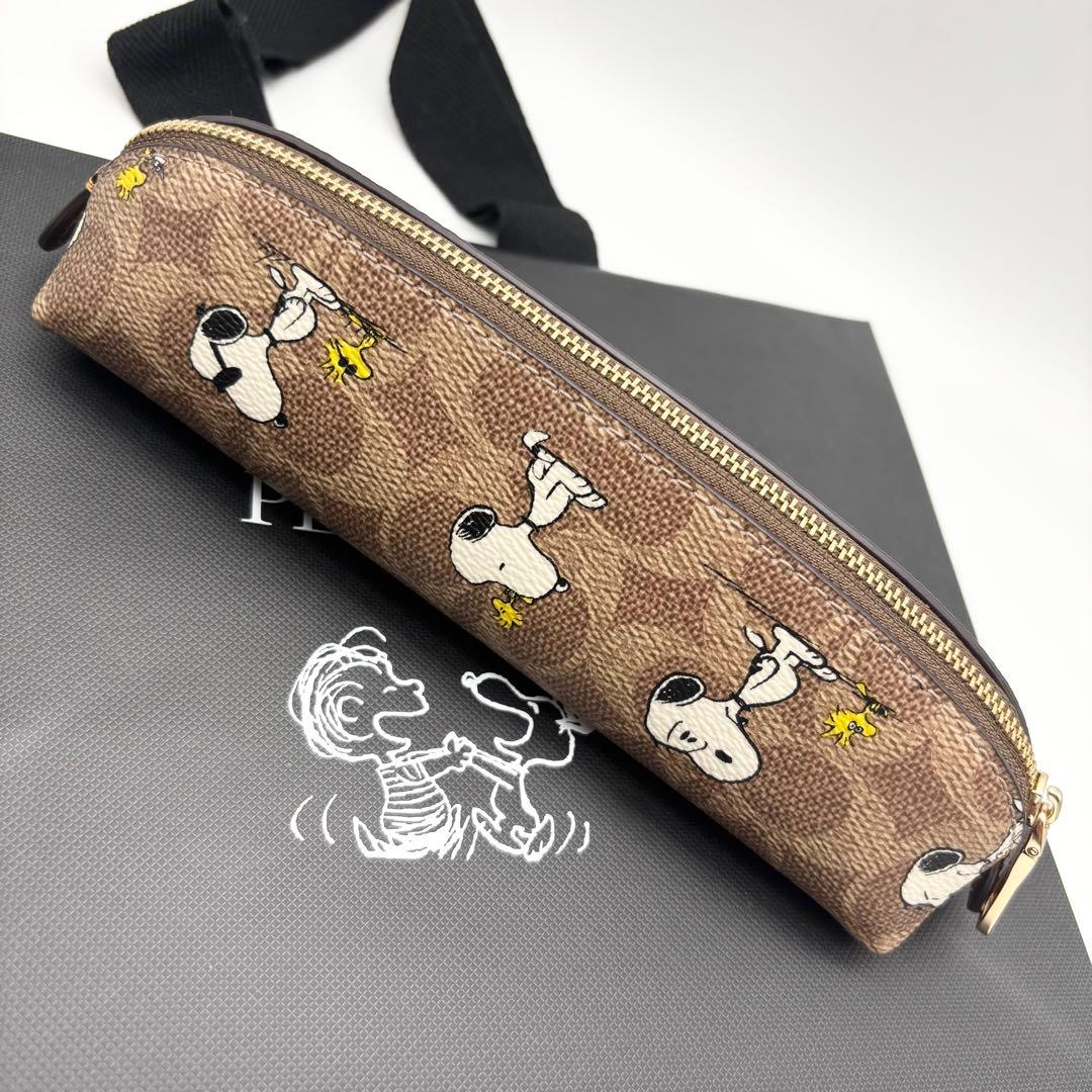 【COACH X PEANUTS】ペンシル ケース！スヌーピー 紙袋付き！
