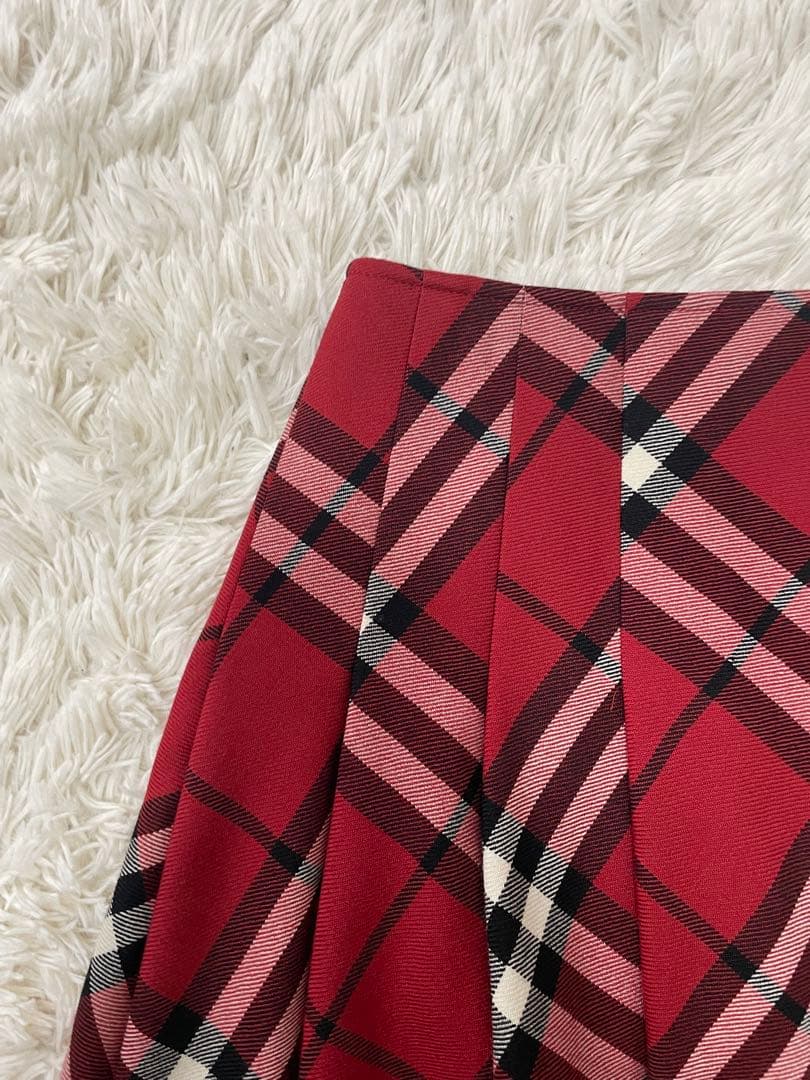 バーバリーブルーレーベル赤チェックベルト付き巻きスカート