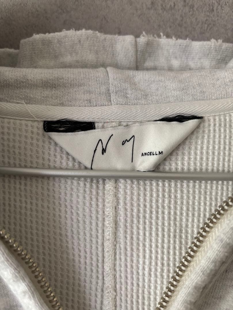 アンセルム 裏地サーマルダメージ加工ジップアップパーカー