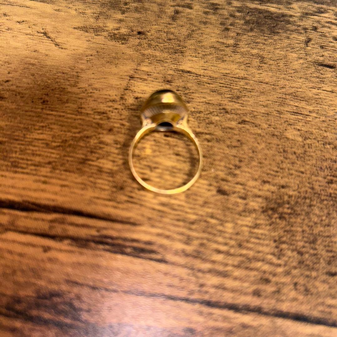 18Kにオーバル型のブラックオニキスのリング