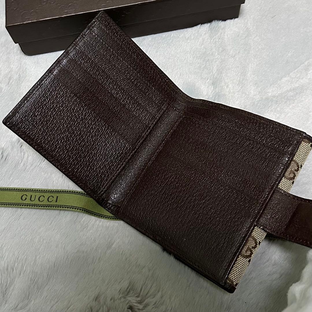 GUCCI グッチ　折り財布　メタルロゴ　キャンバス　GG ブラウン