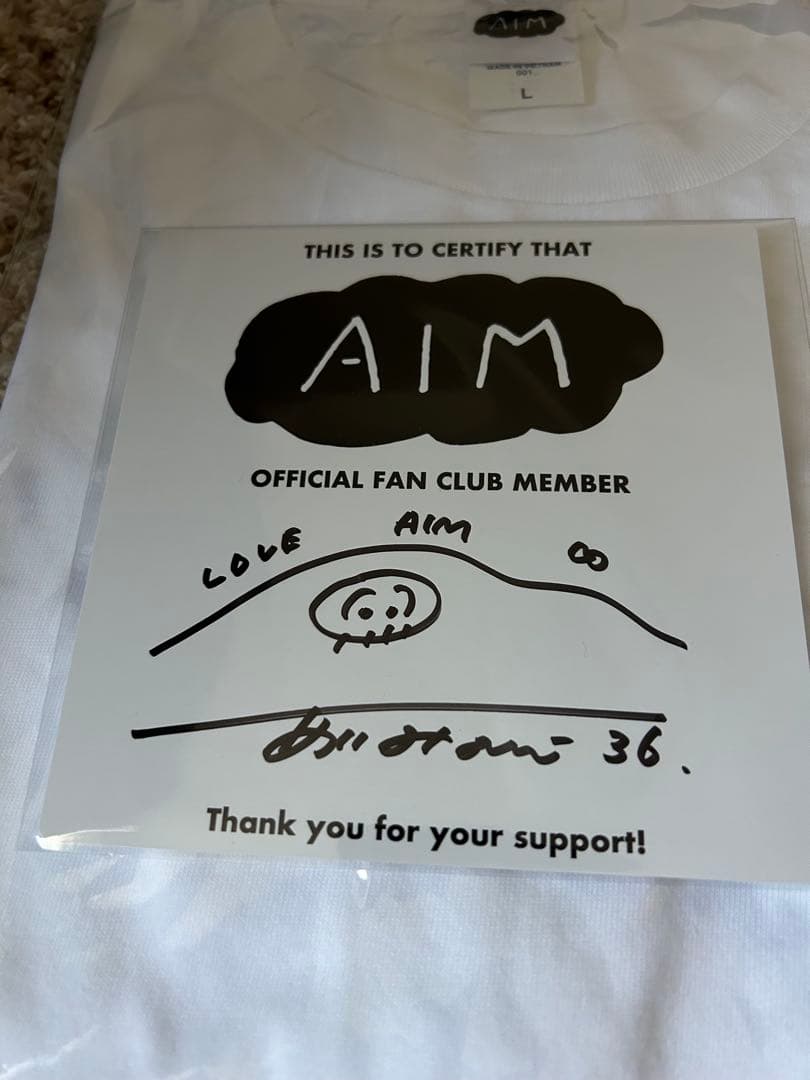 AIM限定デザインTシャツ＆直筆サイン入りミニ色紙セット