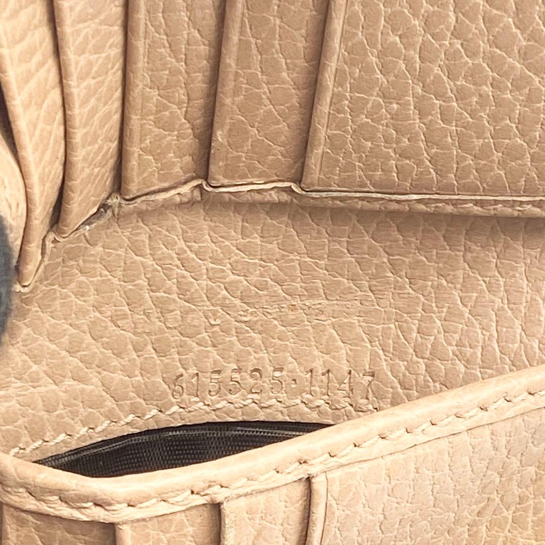 GUCCI インターロッキングG ダラーカーフ 二つ折り財布 ゴールド　ベージュ