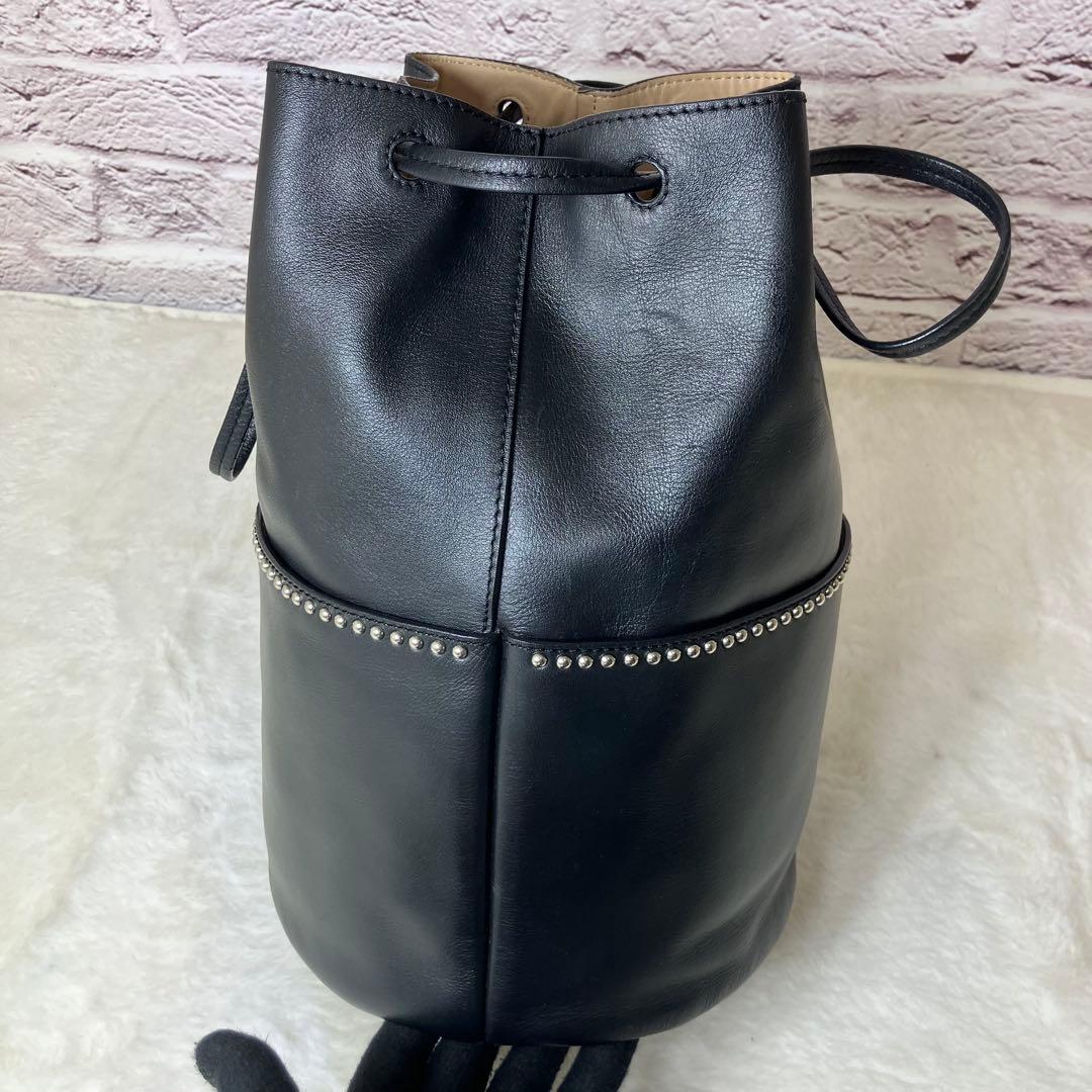 J&M Davidson✨デイジー ウィズ スタッズ 巾着 黒 バンドバッグ