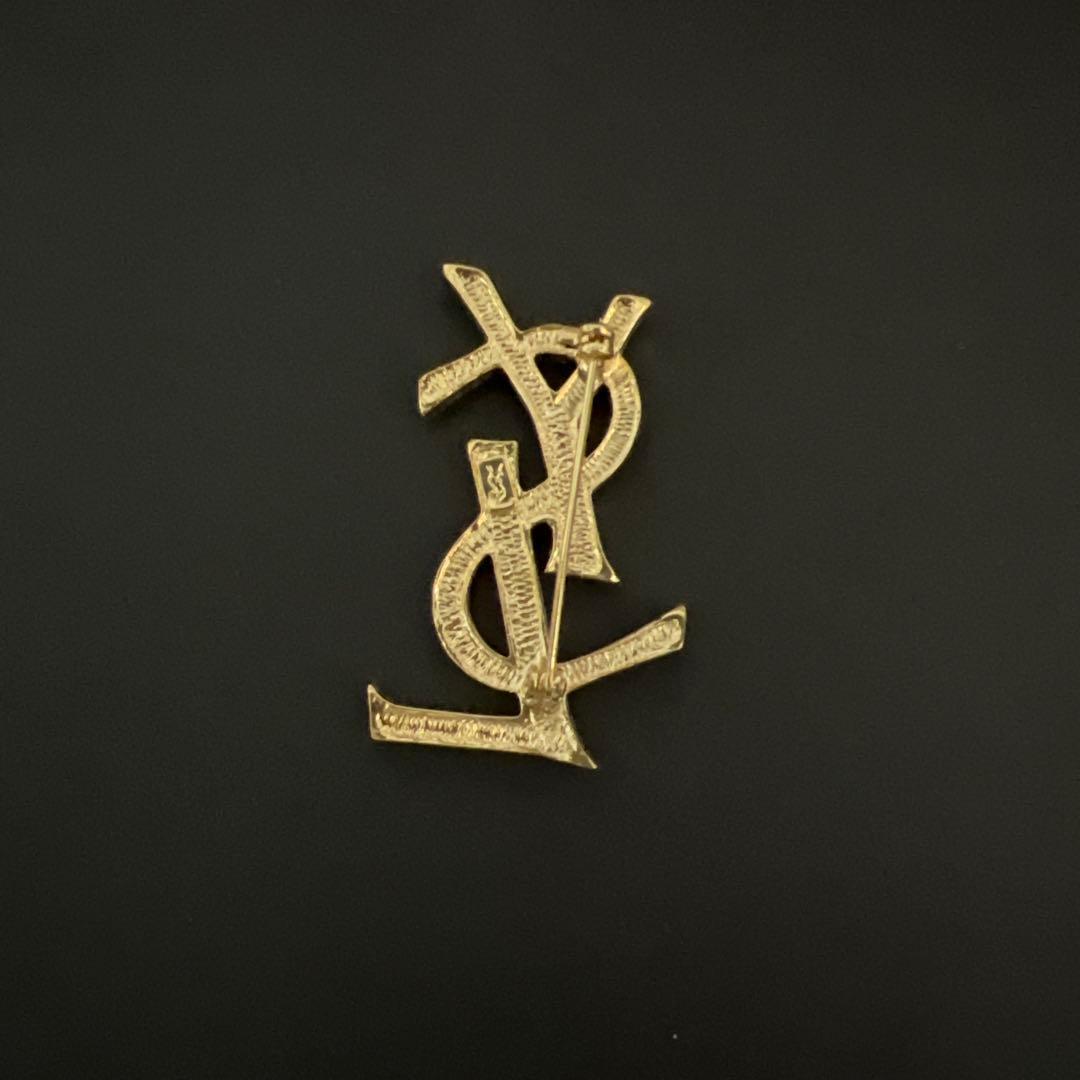 YSL ゴールド ロゴブローチ ストーン装飾