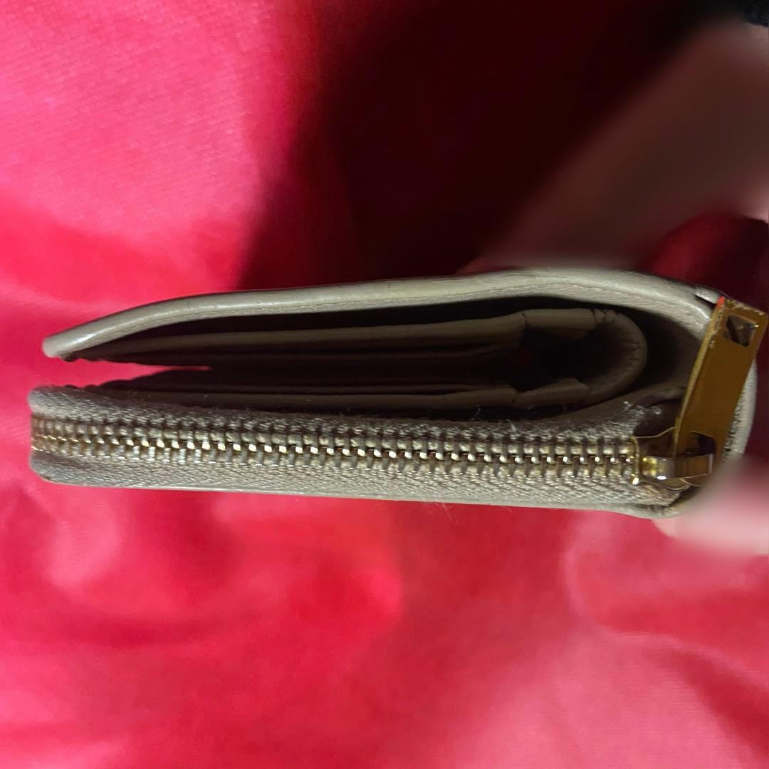 イヴサンローラン 二つ折り財布　カサンドラ　YSL　ピンクベージュ