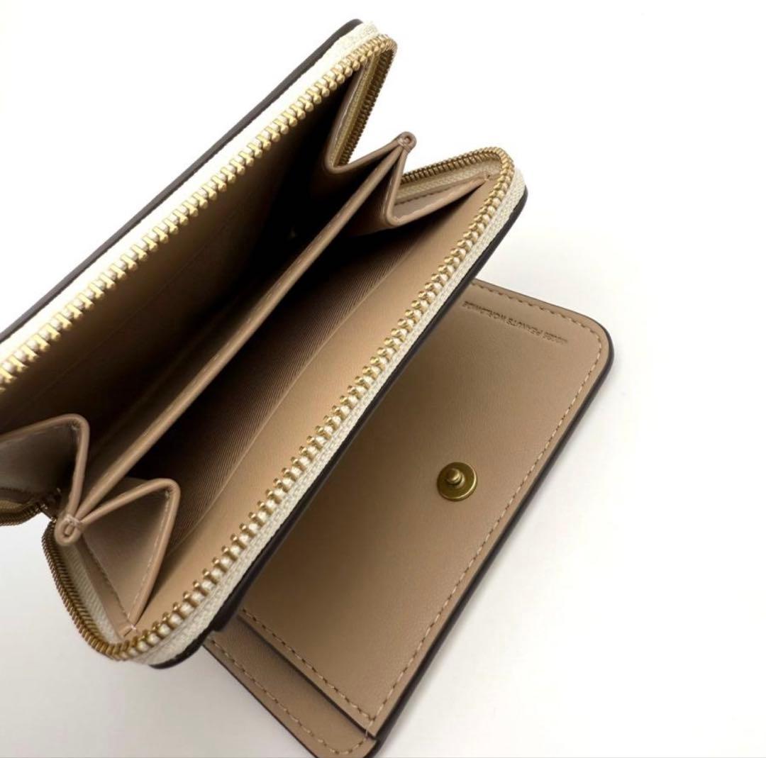 【新品未使用】coachスヌーピー 二つ折り財布コーチスヌーピーSNOOPY