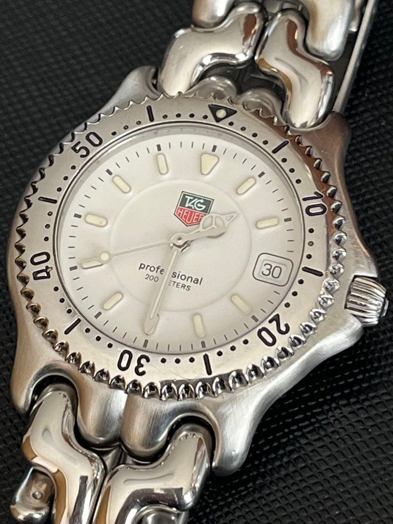 タグホイヤー セルWG1112-KO QZ ホワイト メンズ腕時計 中古美品