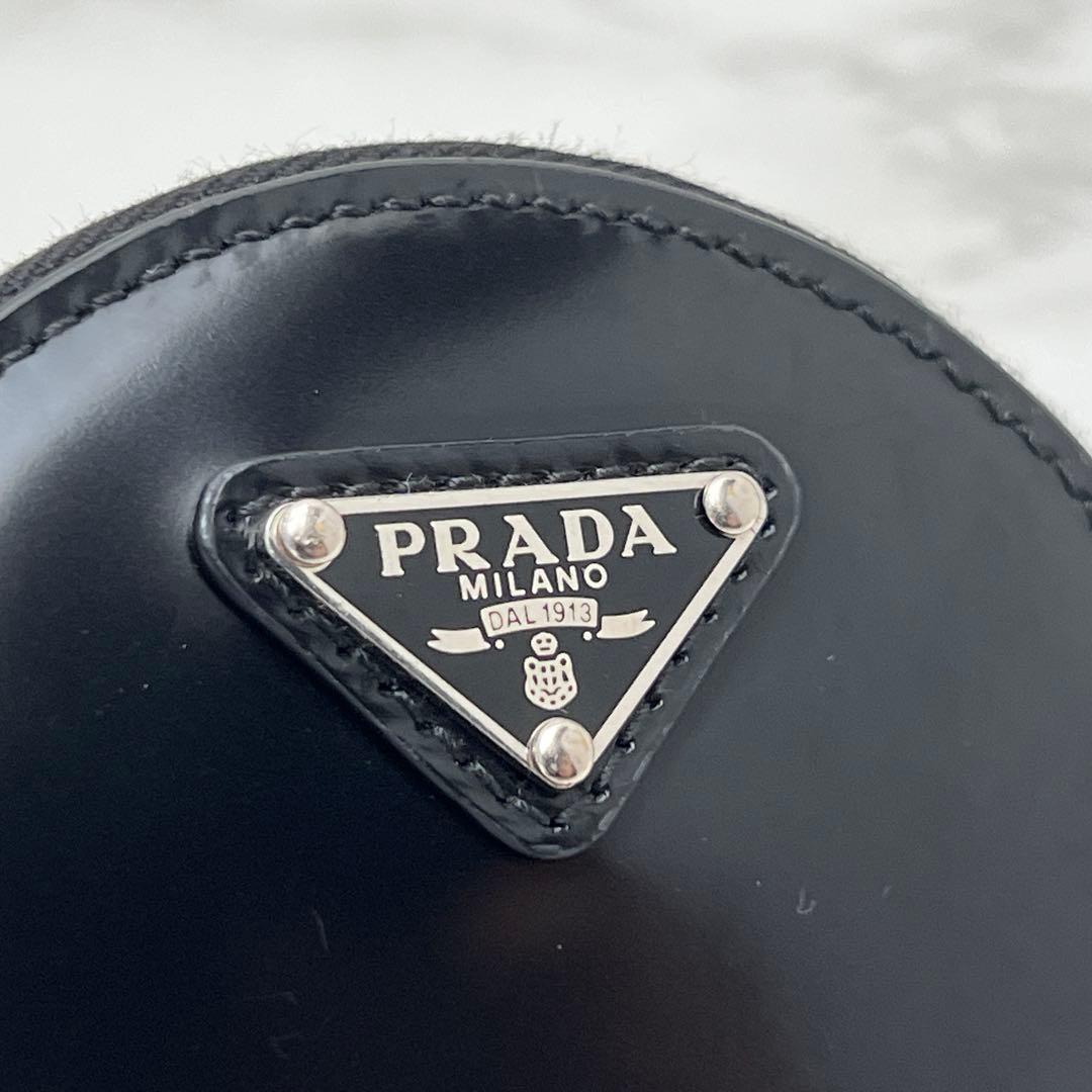 プラダ ブラッシュドレザー ラウンド ミニポーチ ケース ブラック