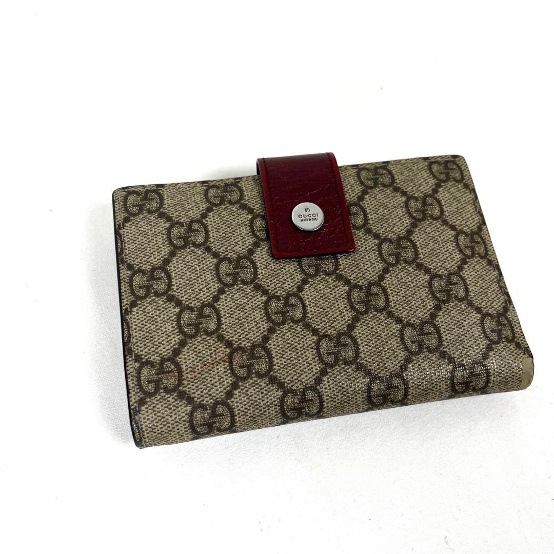 グッチ　折り財布　GGスプリーム　ロゴ総柄　がま口　ミディアム　PVC レザー