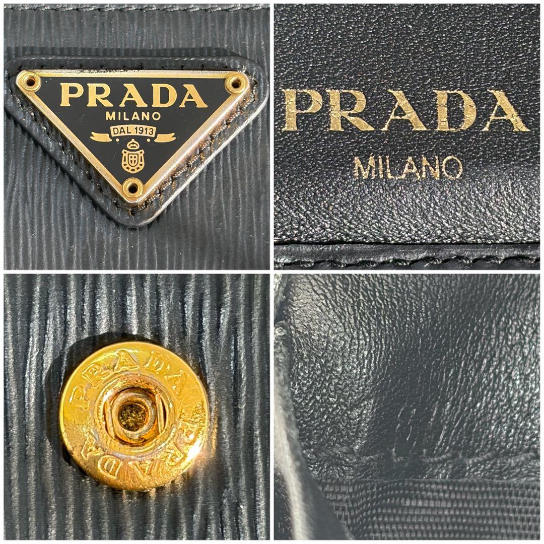 RFID搭載/美品✨プラダ　二つ折り財布 ヴィッテロムーヴ　レザー 三角 黒