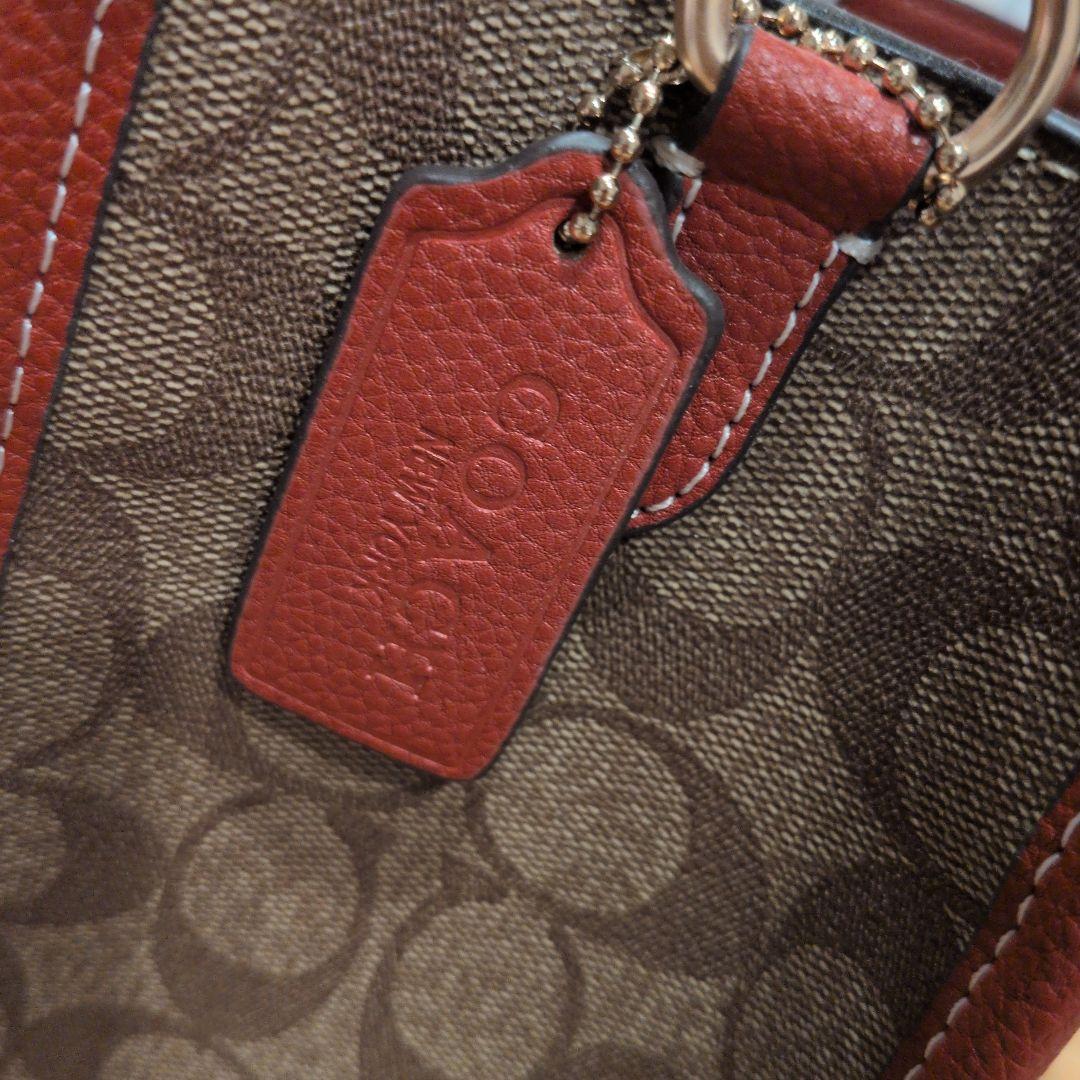 【美品】コーチスヌーピコラボデンプシートート22・シグネチャー キャンバスバッグ