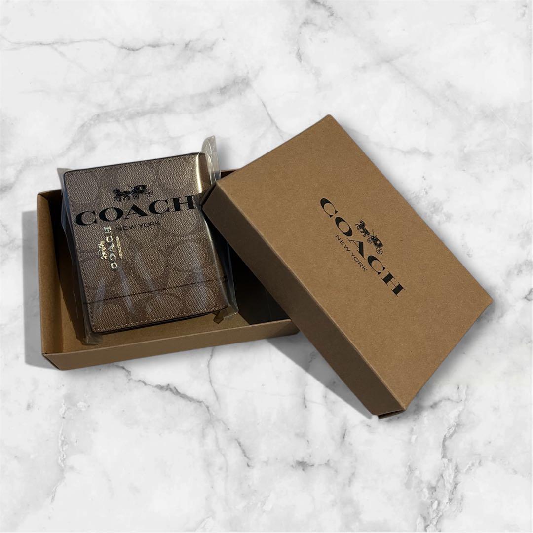 新品 COACH 二つ折財布 シグネチャー ラウンドファスナー ブラウン