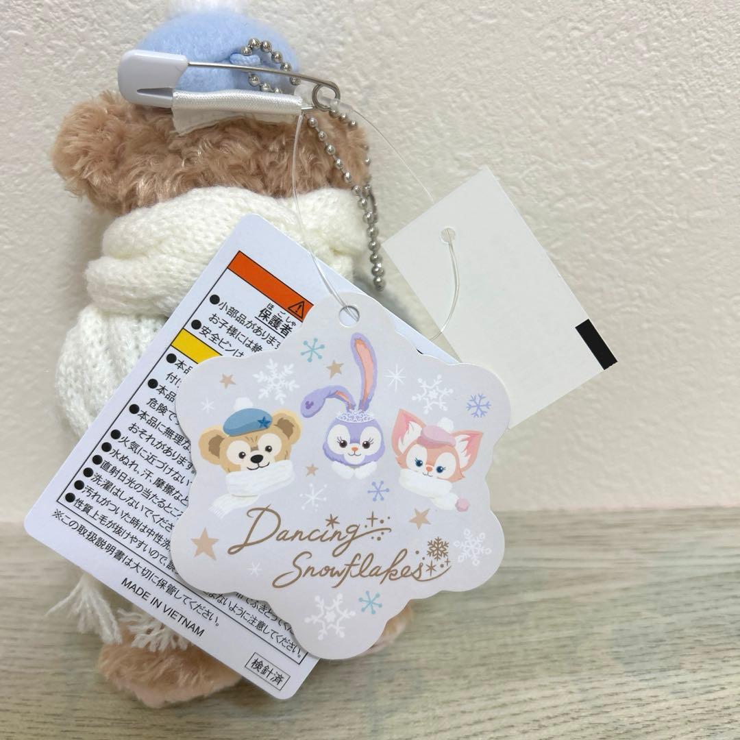 ディズニーダンシングスノーフレークスダッフィーぬいぐるみバッジ　新品