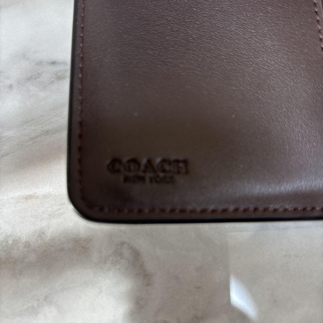 【美品】COACH コーチ 折り財布シグネチャーエンボス加工パテントレザー　黒