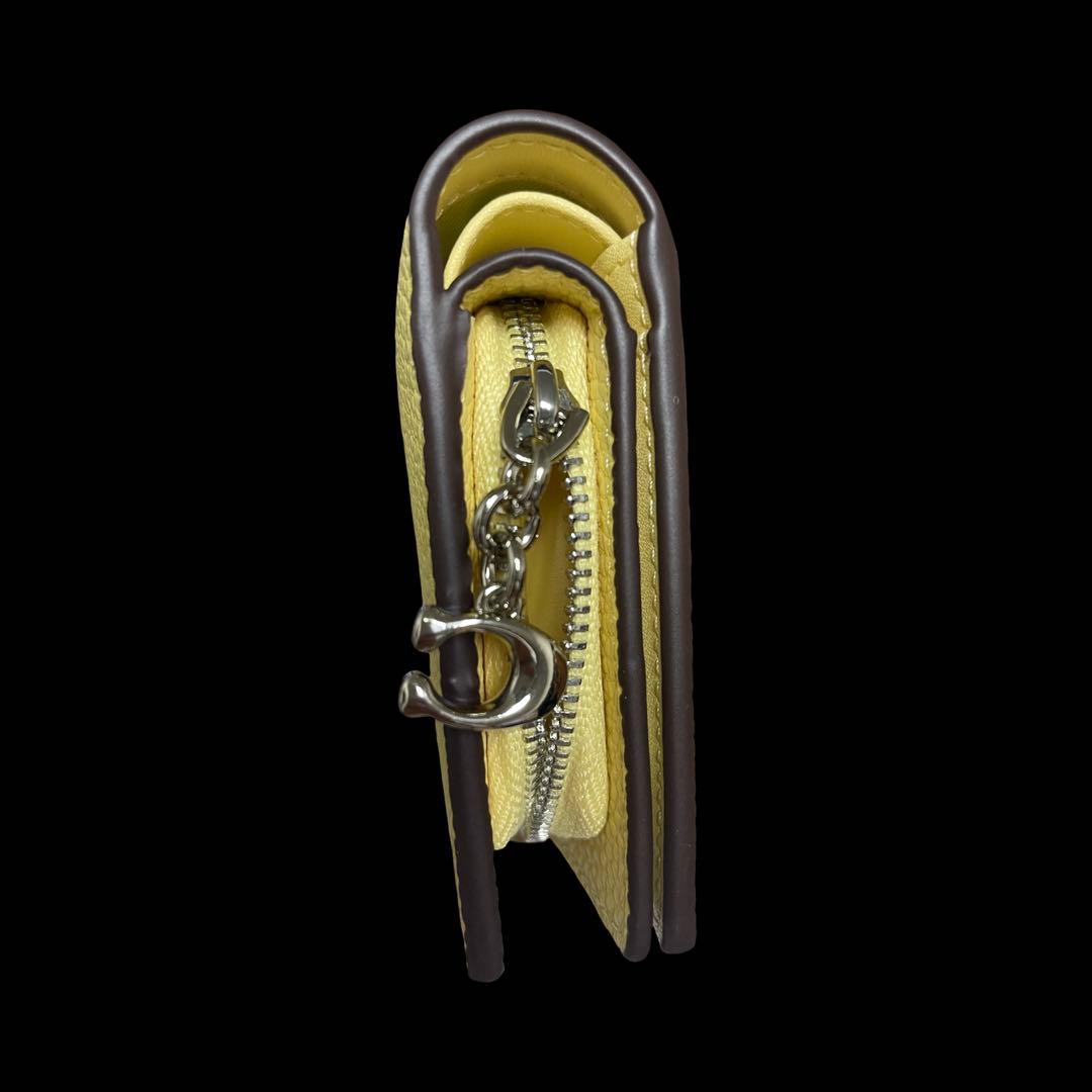 コーチ　スヌーピー　二つ折り財布　チャーリーブラウン