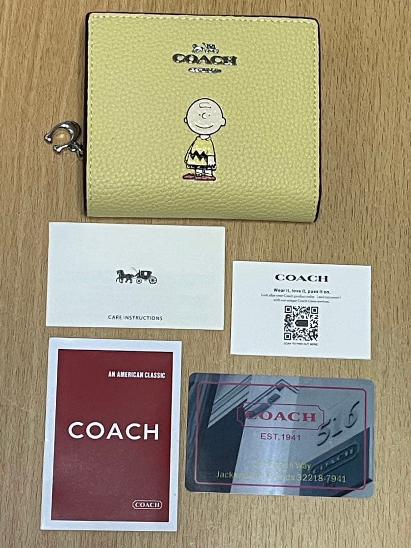 コーチ　スヌーピー　二つ折り財布　チャーリーブラウン