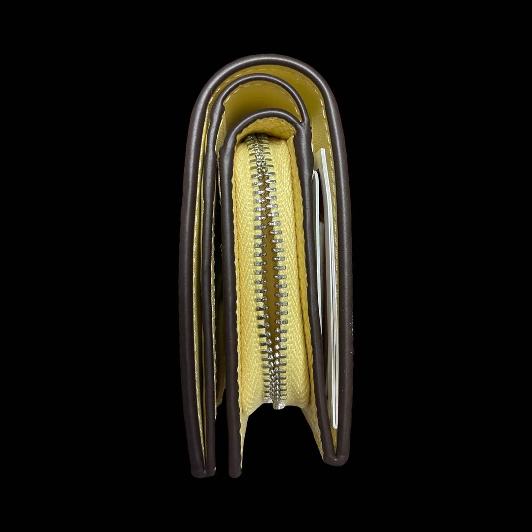 コーチ　スヌーピー　二つ折り財布　チャーリーブラウン