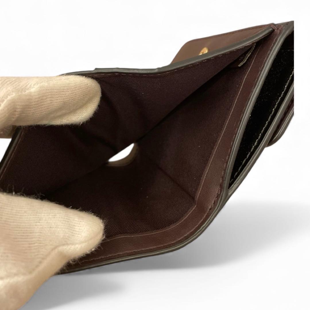 【未使用級】COACH 二つ折り財布 パテントレザー シグネチャー ブラック 黒