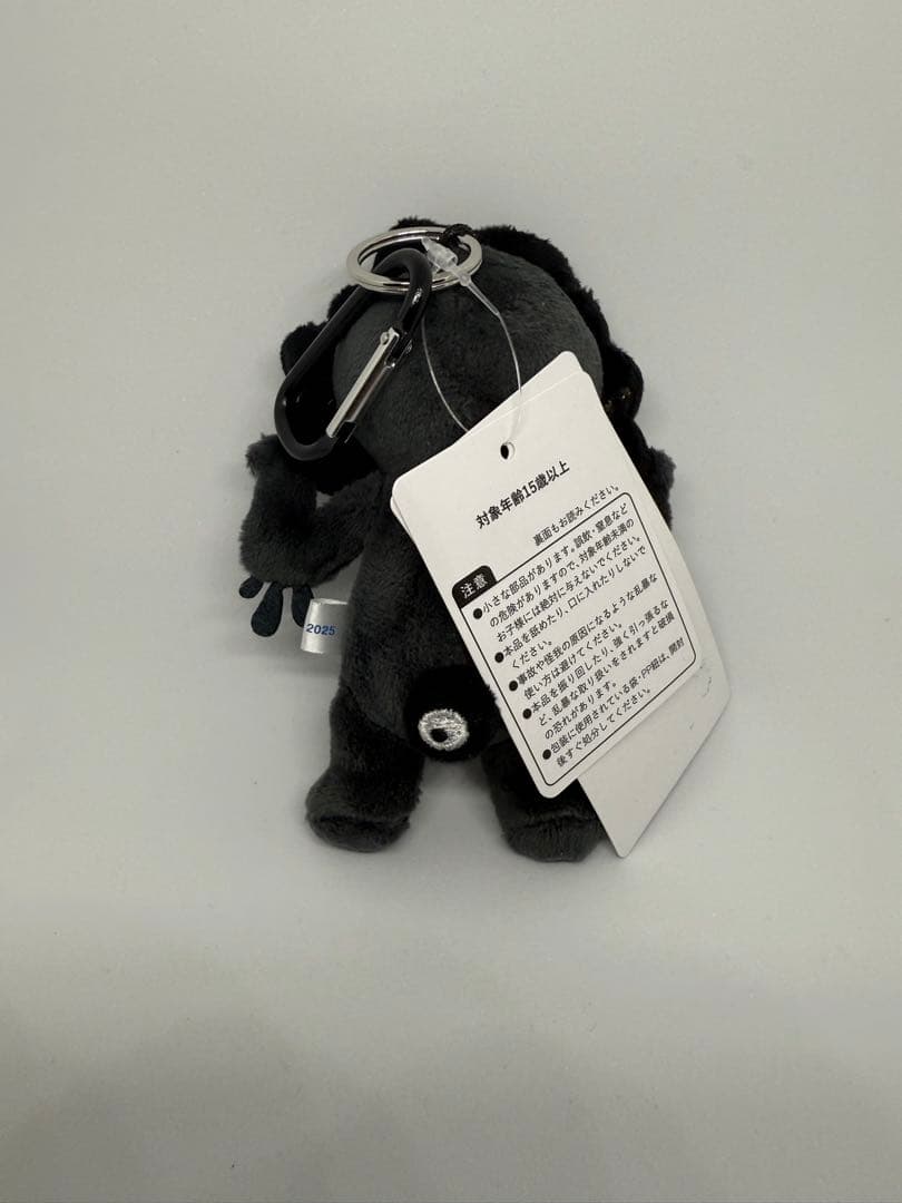 新品未使用タグ付き 黒ミャクミャクカラビナ付きマスコット 立ち