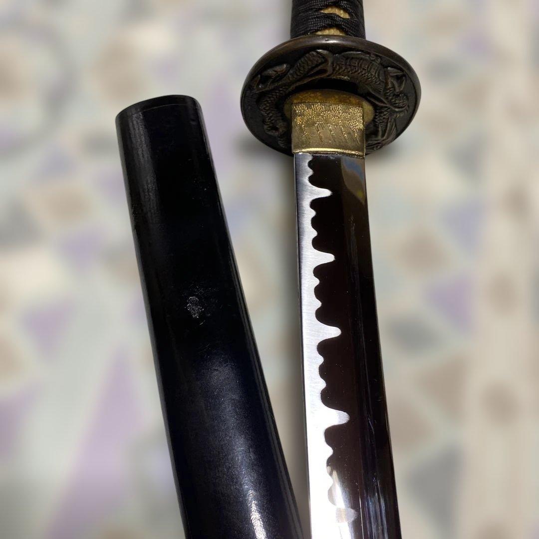 模造刀(小柄付) 黒柄 龍彫楕円鍔 黒呂鞘