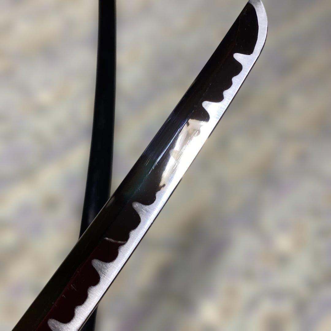 模造刀(小柄付) 黒柄 龍彫楕円鍔 黒呂鞘