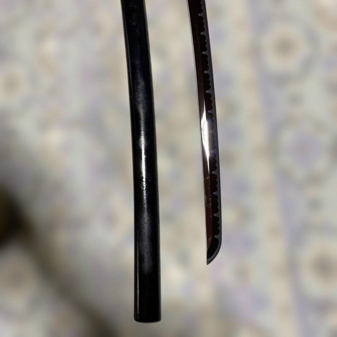 模造刀(小柄付) 黒柄 龍彫楕円鍔 黒呂鞘