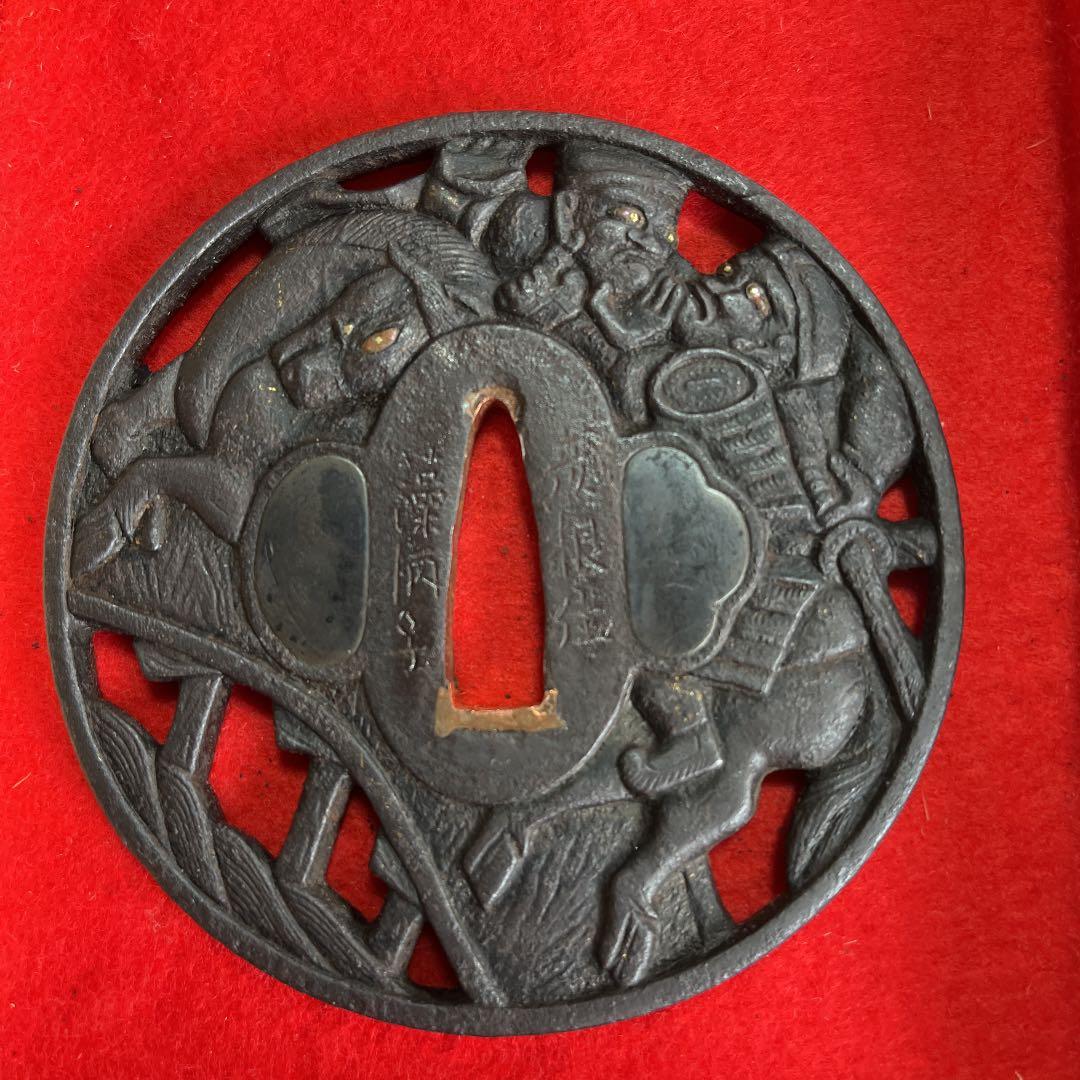 武者図透かし鉄鍔