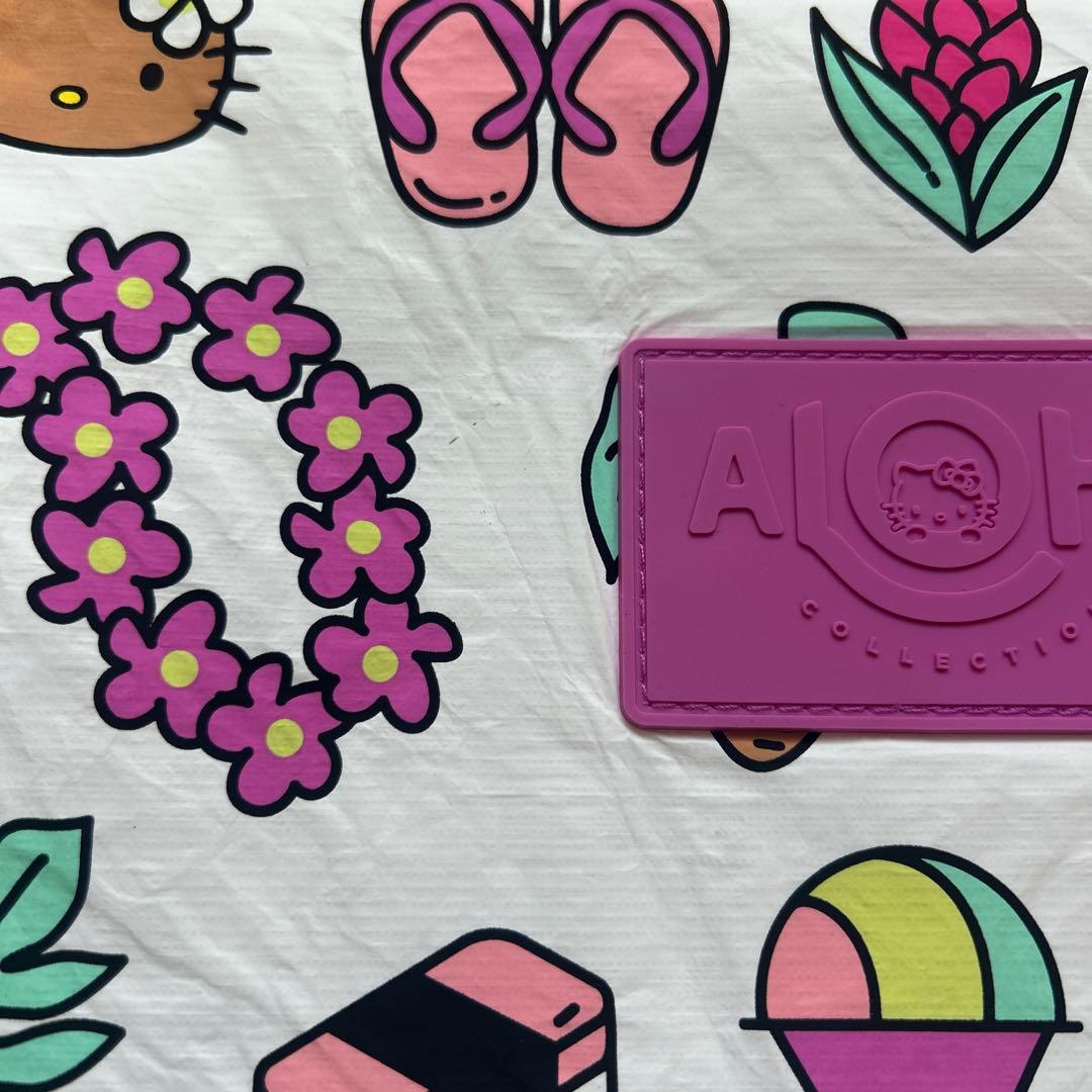 新品　Aloha Collection ハローキティ クラッチバッグ