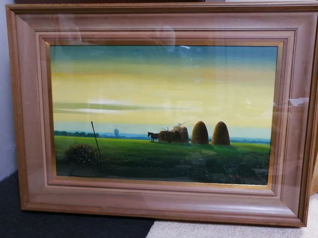 松本竹敏「夕暮れに草を積む農夫」