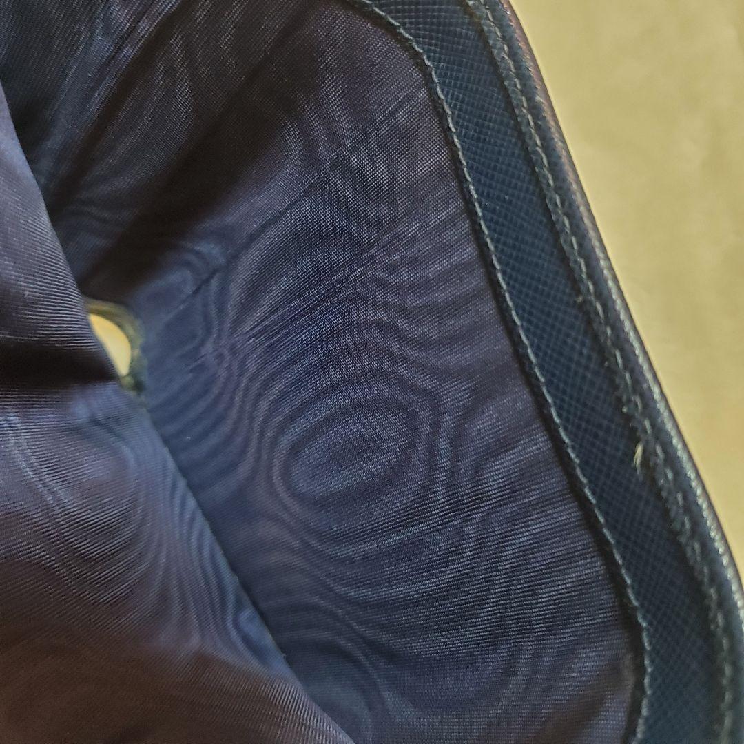 美品　PRADA 折り財布 サフィアーノ メタルロゴ リボン ブルー