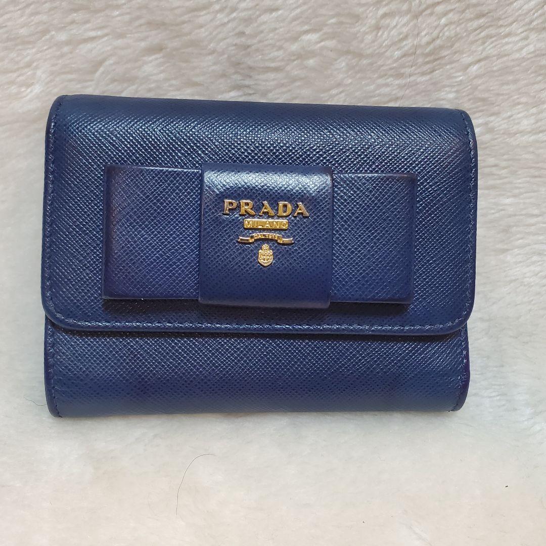 美品　PRADA 折り財布 サフィアーノ メタルロゴ リボン ブルー