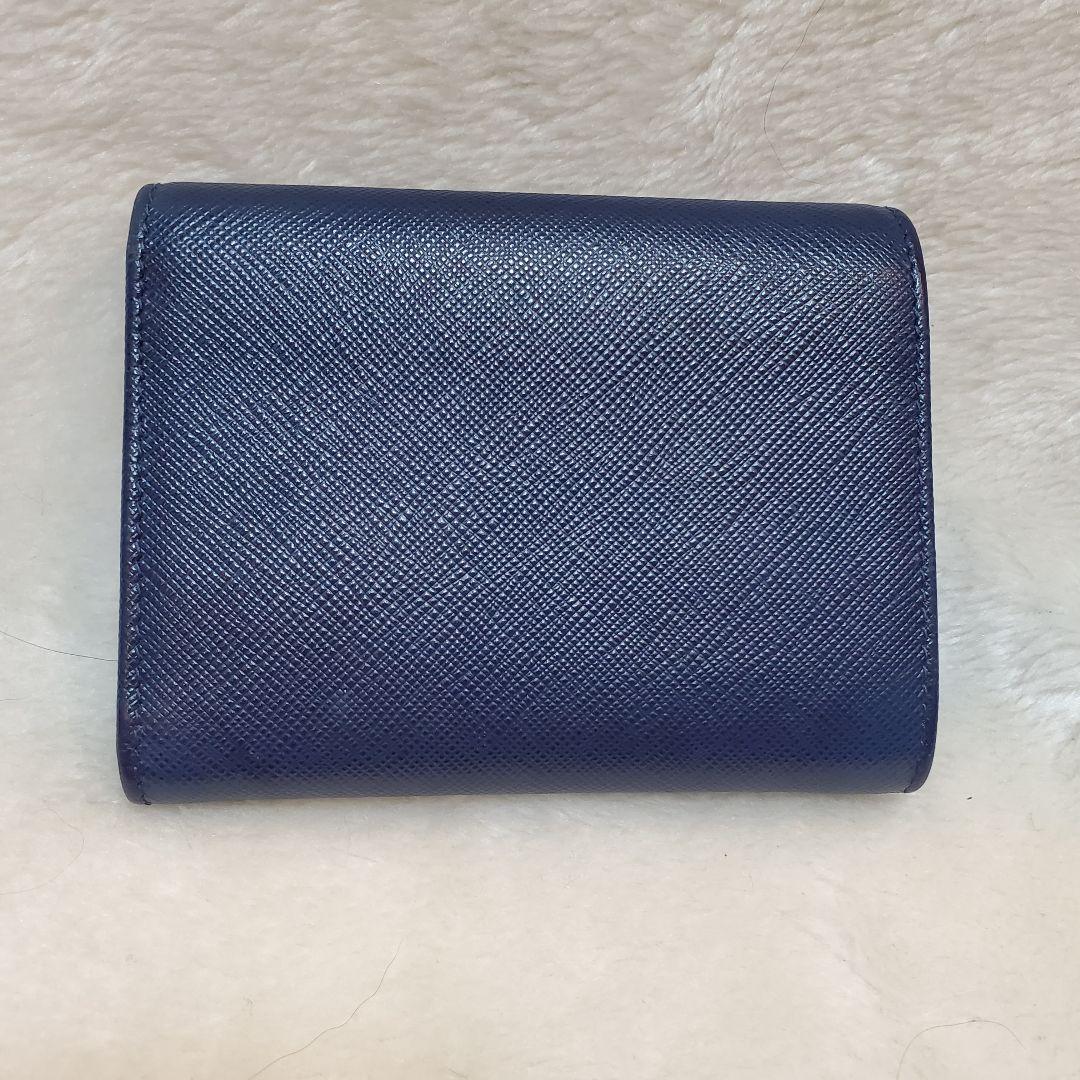 美品　PRADA 折り財布 サフィアーノ メタルロゴ リボン ブルー