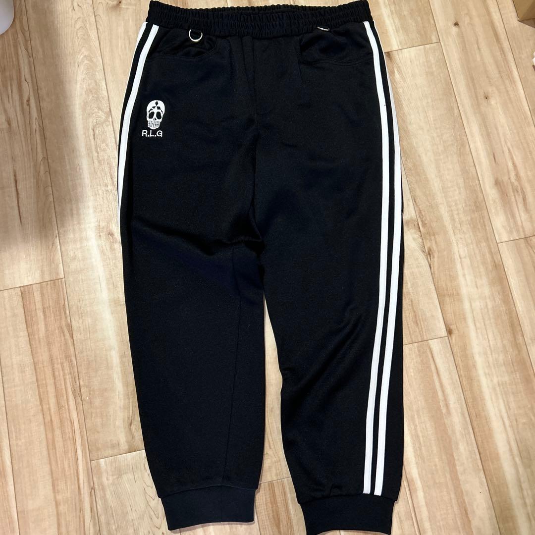 ラリー RALEIGHトラックスーツ cyberdyne RADIOTS 666