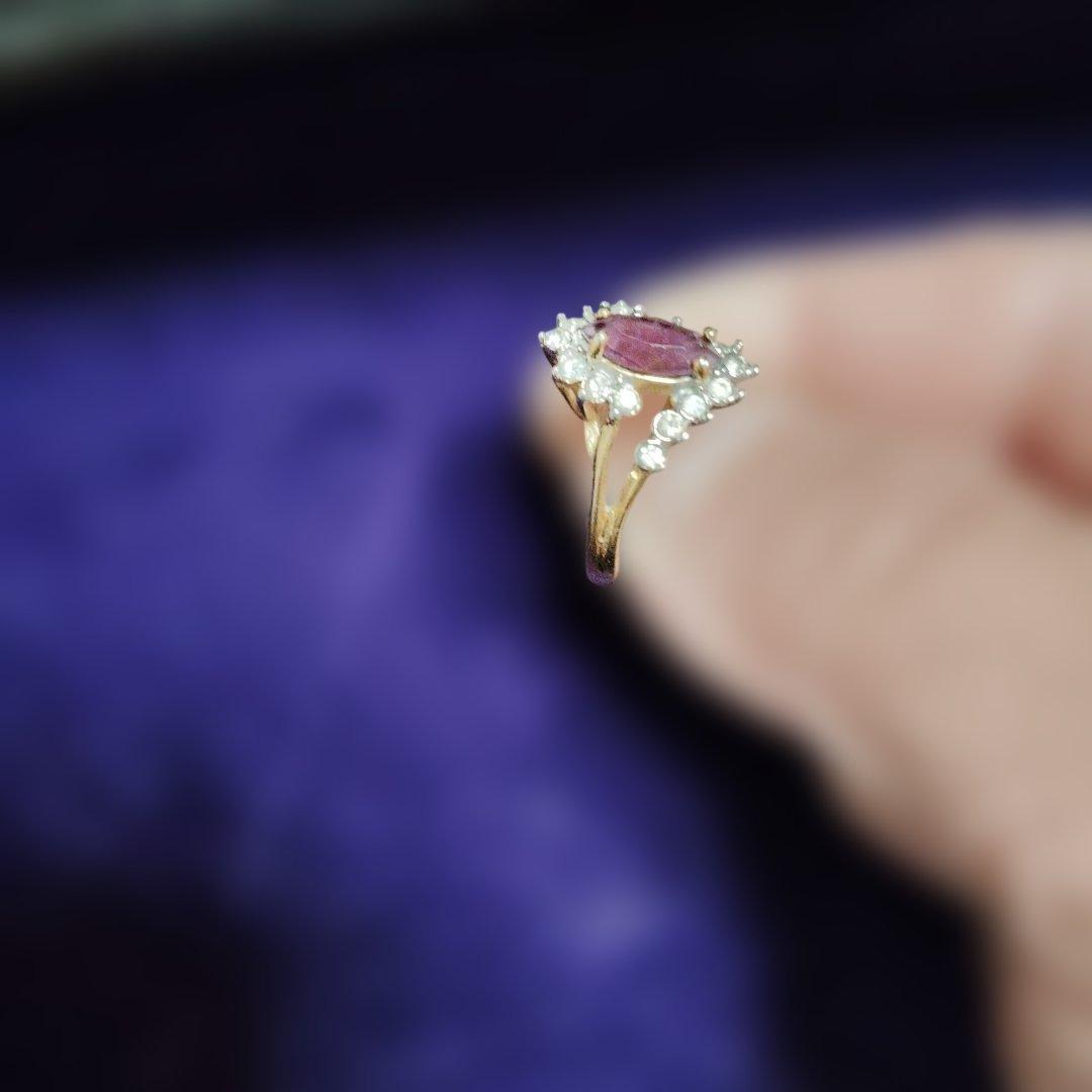 紫色の中心石 花デザインリング