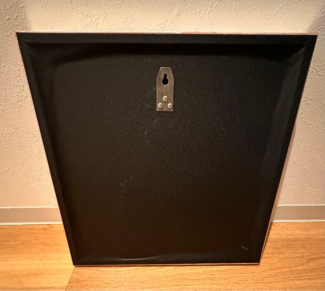 角穴古銭 背面双竜の額縁