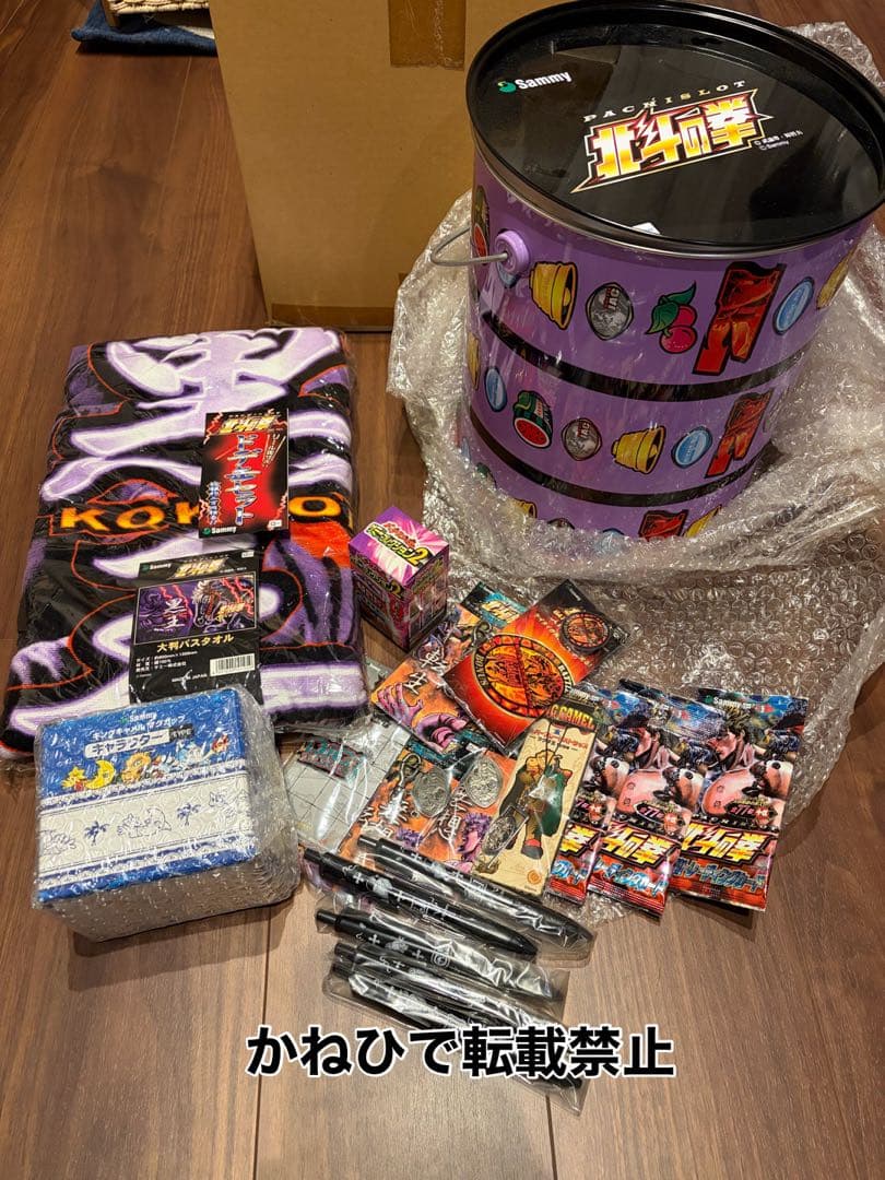 おまけ付き 初代パチスロ 北斗の拳 リール缶 ドデカセット 景品多数入り