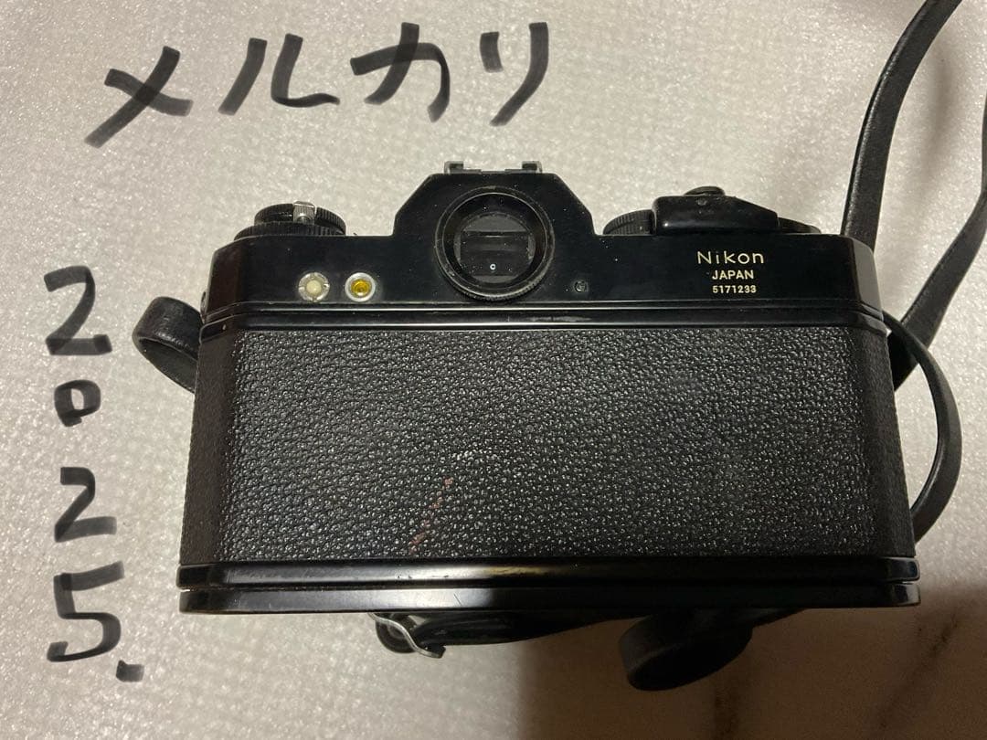 NIKOMAT・EL。一眼レフカメラ。ナショナルPE-32Sフラッシュ付き。