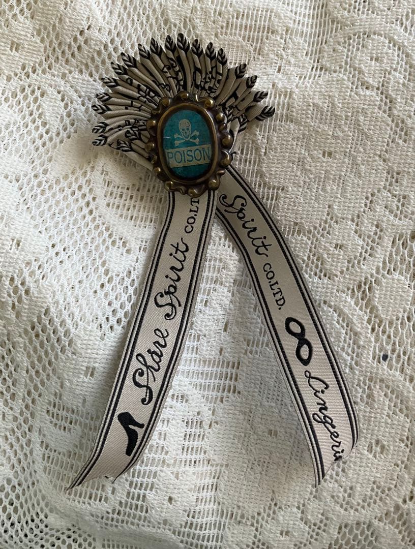 シェアスピリット　タイブローチ