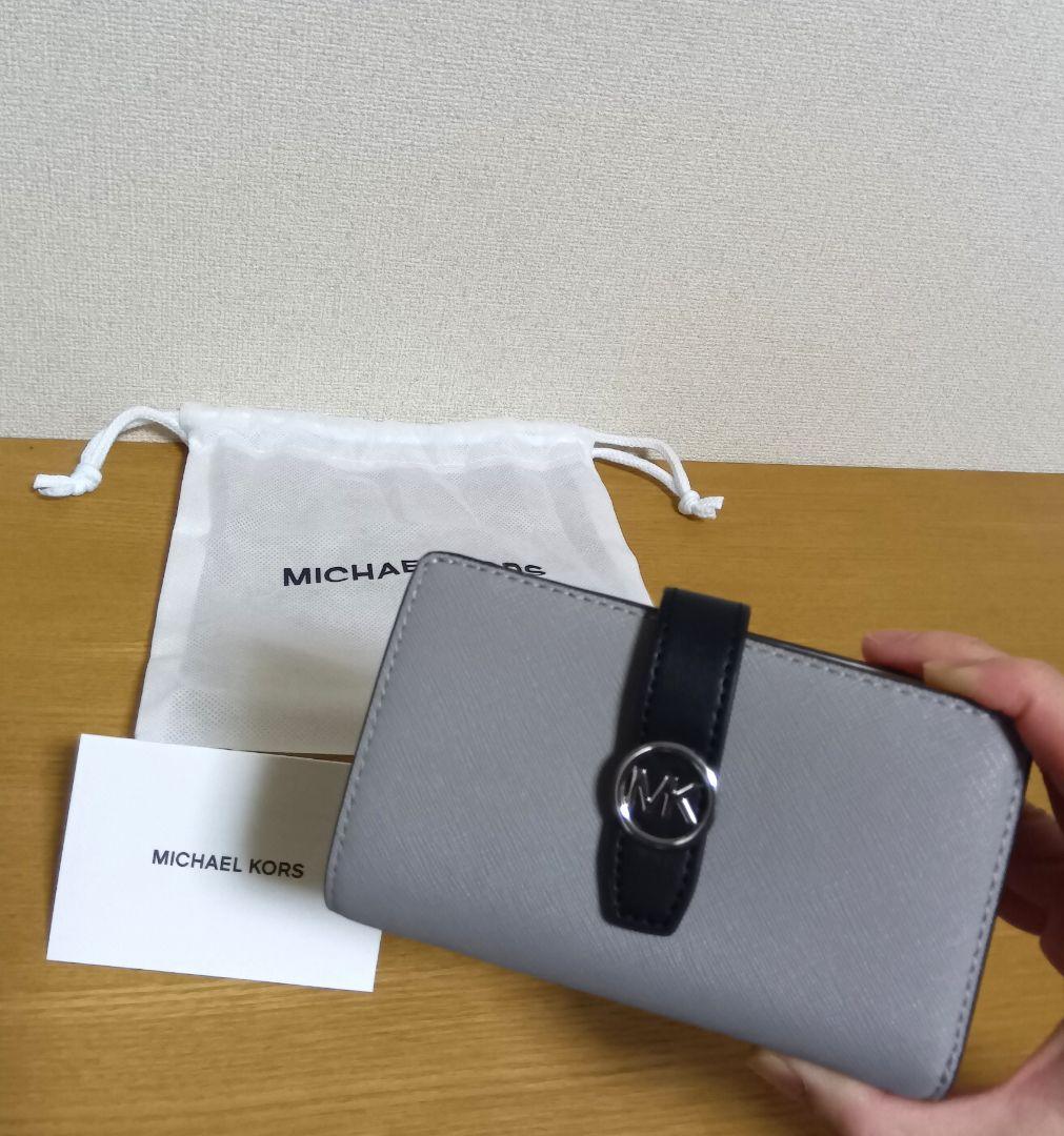 マイケルコース／新品未使用 二つ折り財布 保存袋付き