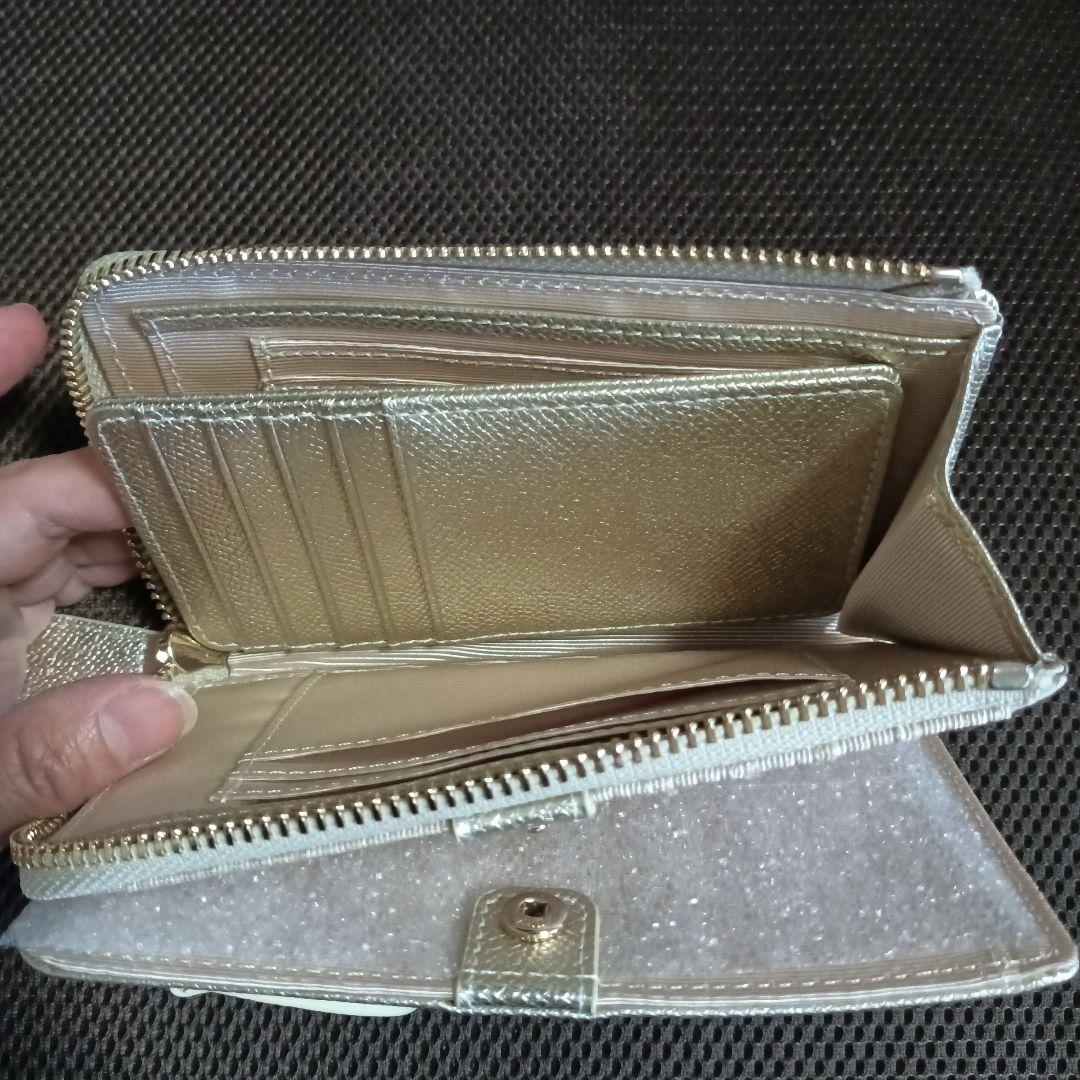 ディノスの牛革ミドルウォレット シャンパンゴールド