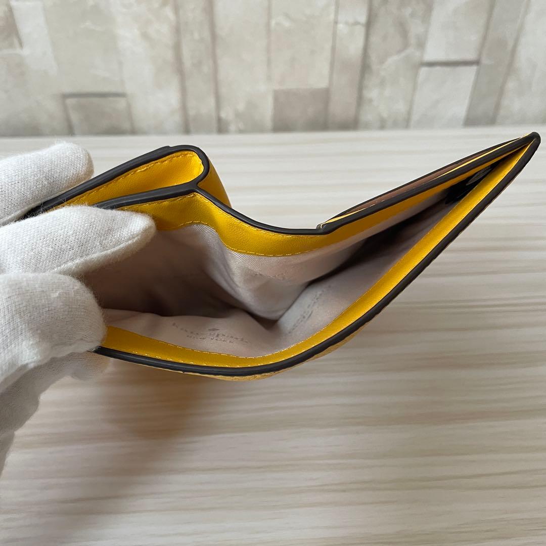 早い者勝ち！訳あり新品 kate spade 二つ折り財布 イエロー