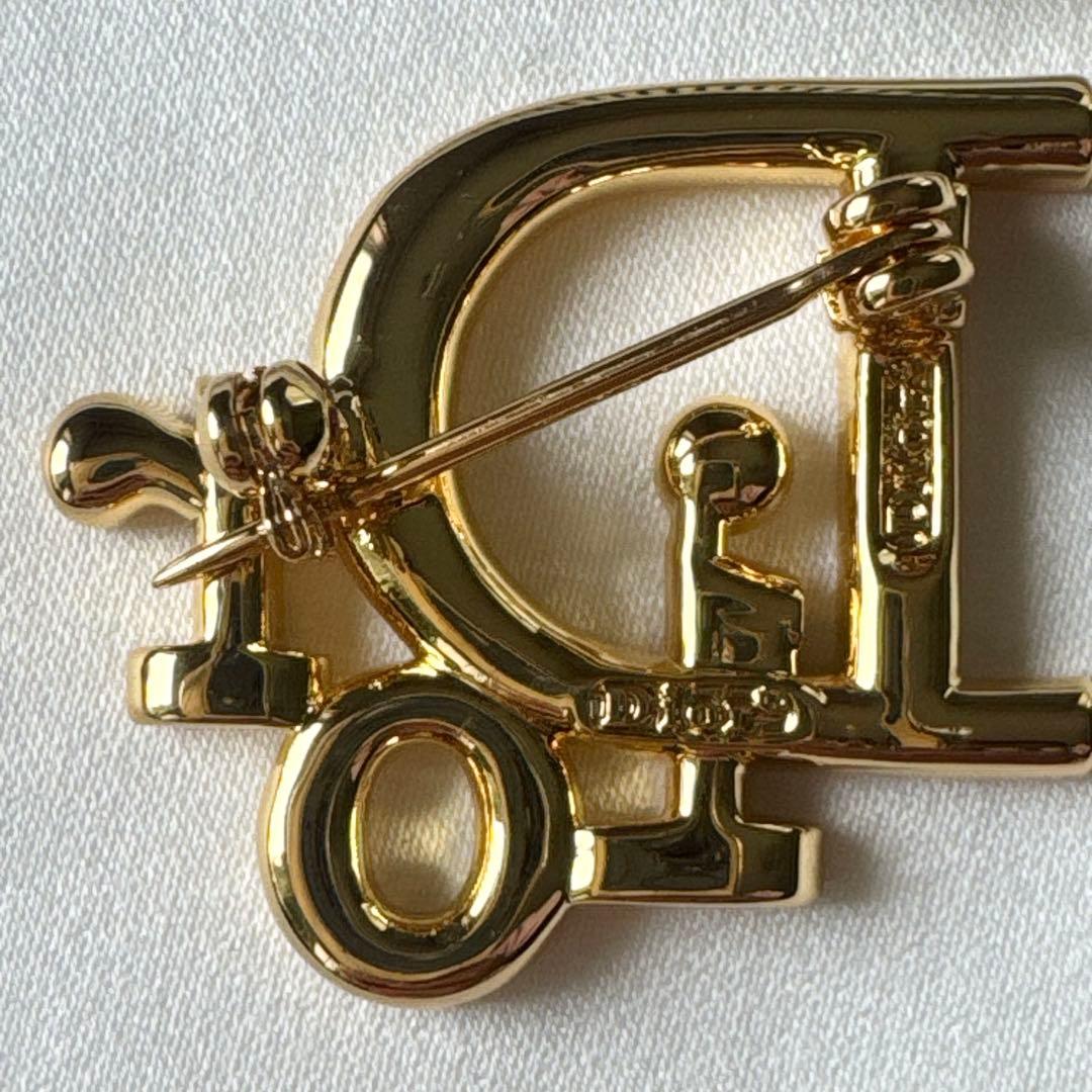 クリスチャンディオール ロゴブローチ ゴールド トロッター