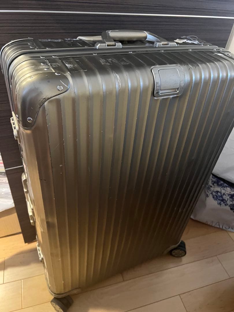 オミ　【正規品】RIMOWAトパーズ チタニウム チェックインL TSA
