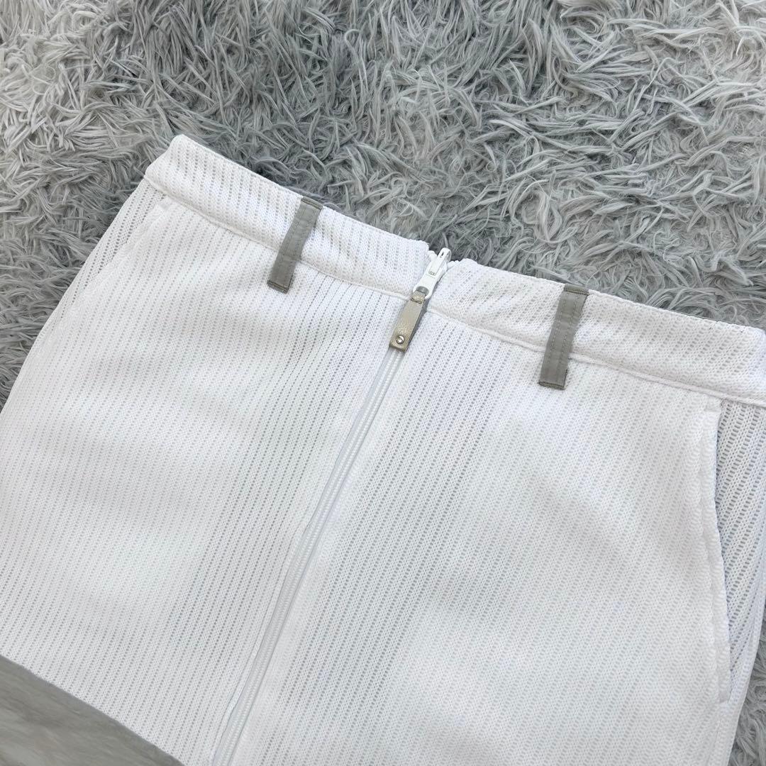 超美品　プーマゴルフ　セットアップ　中綿ベスト　スカート　リバーシブル　ホワイト