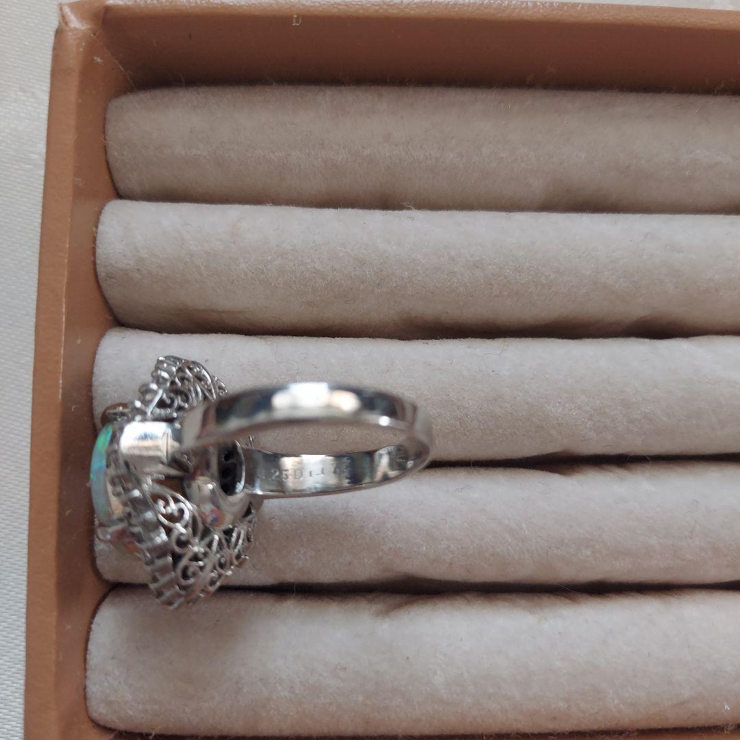 オパール3.25ct 重量12.5g ダイヤ取巻き大粒オパール指輪