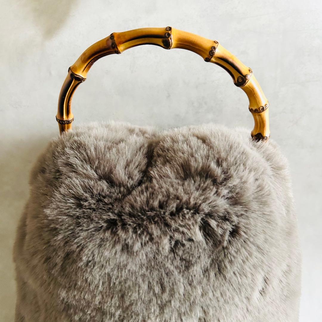 美品ヴィオラドーロファーバンブーハンドル巾着バック秋冬