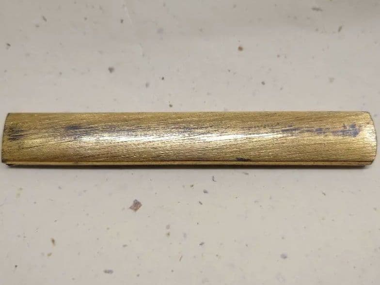 小柄袋、赤銅地に太刀と采配図