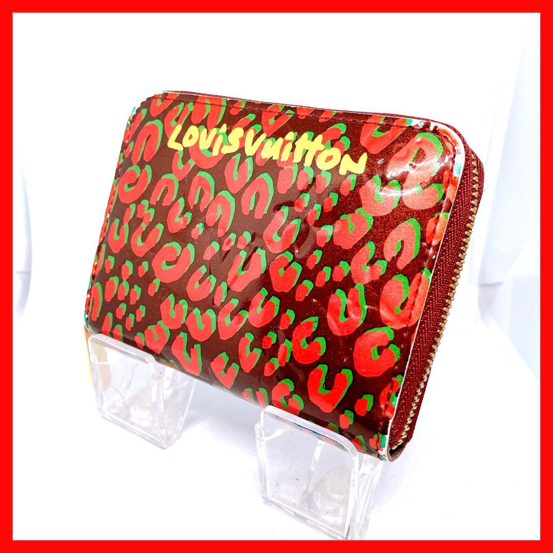 818 ルイヴィトン モノグラム　レオパード　折り財布　ジッピーパース