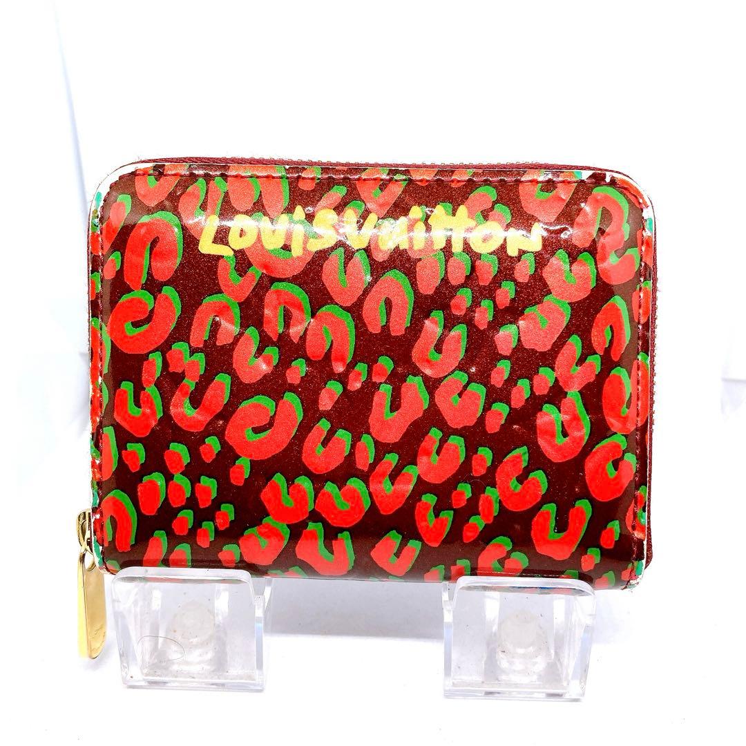 818 ルイヴィトン モノグラム　レオパード　折り財布　ジッピーパース